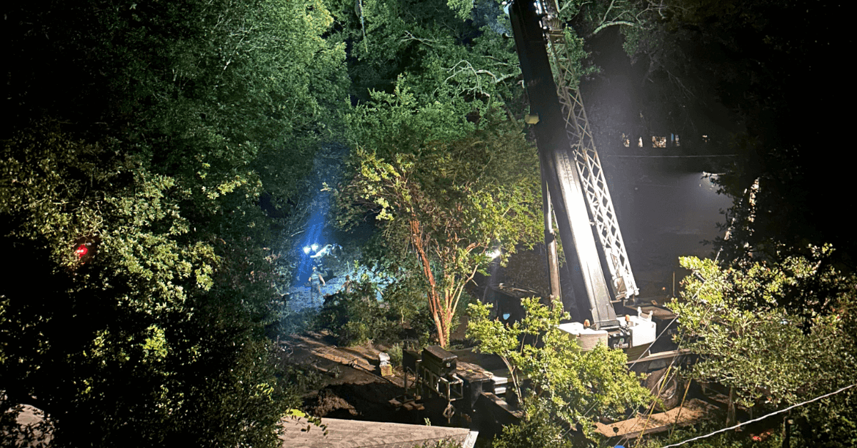 Fallen tree on roof in Pensacola FL after storm