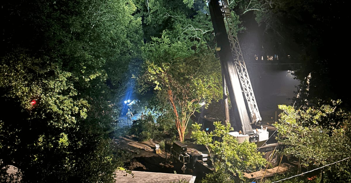 Fallen tree on roof in Pensacola FL after storm